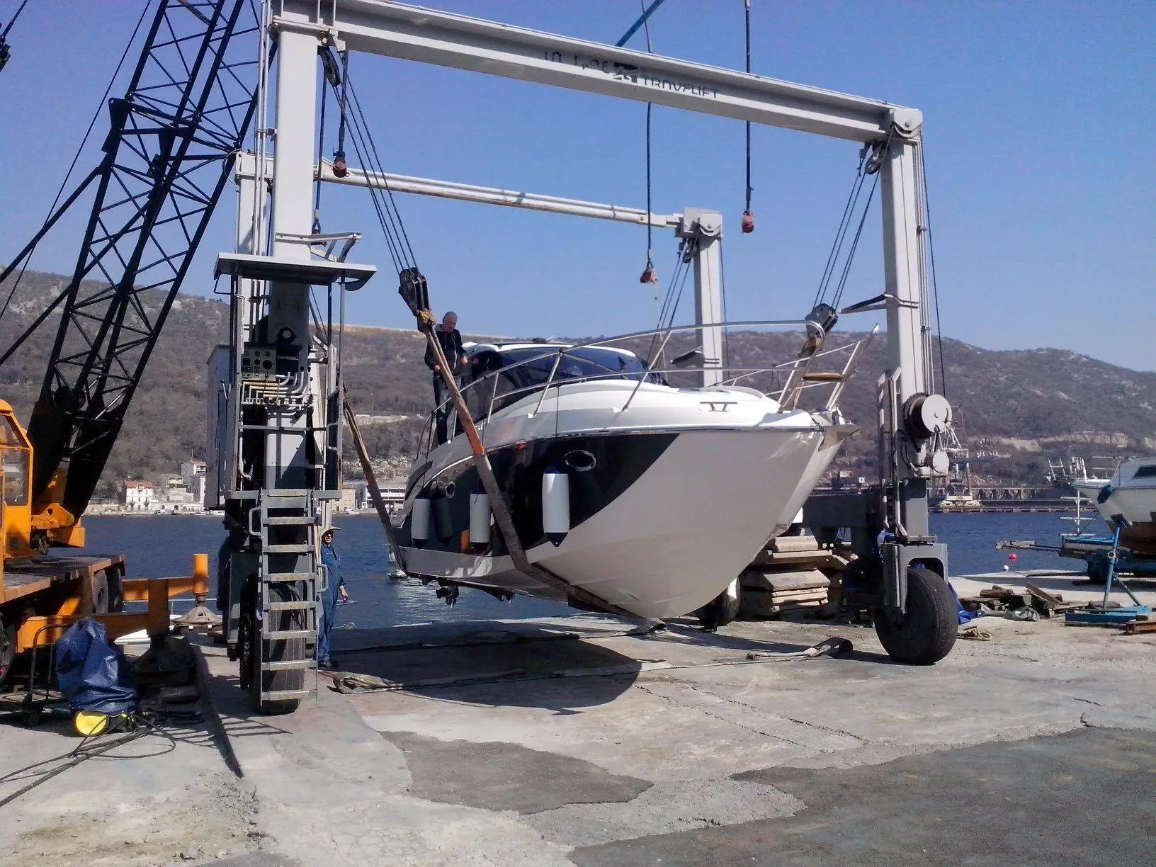Technician performing final yacht system checks