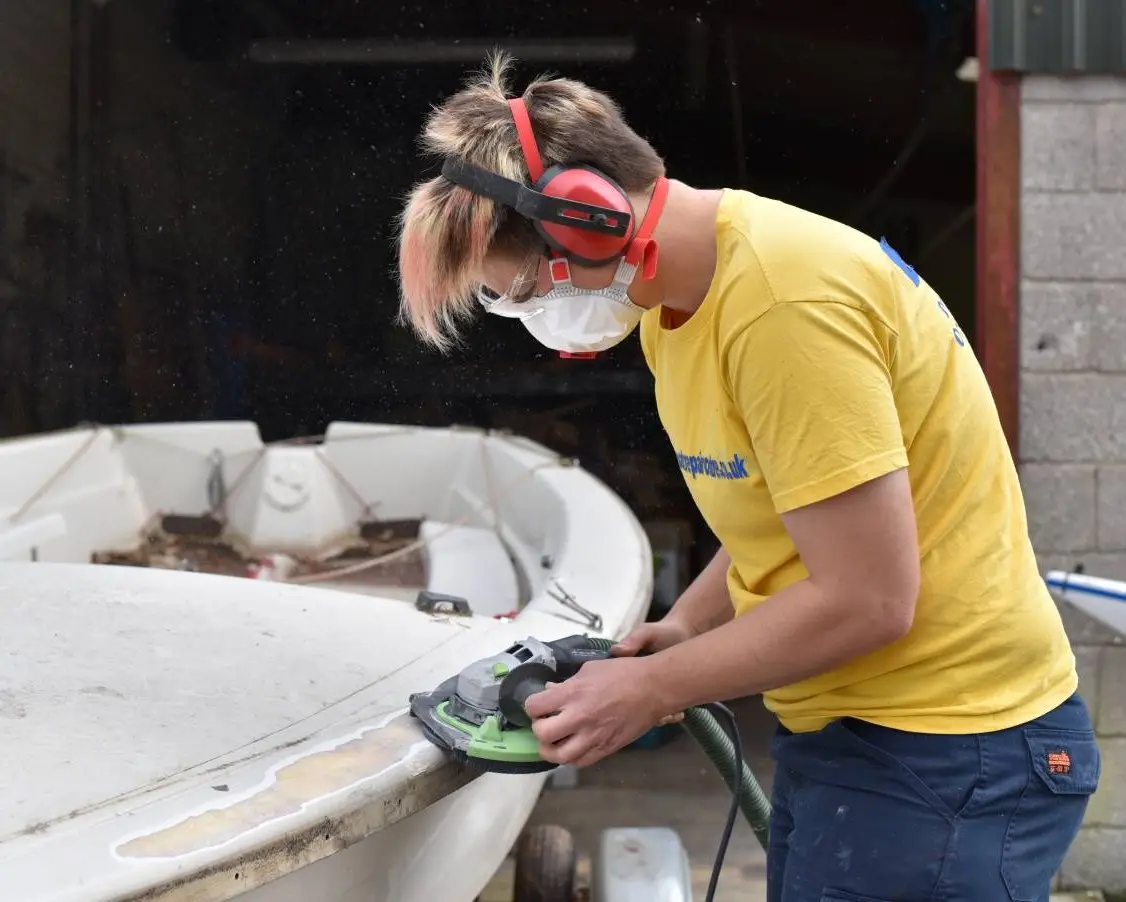 Restoring varnished timber on a yacht