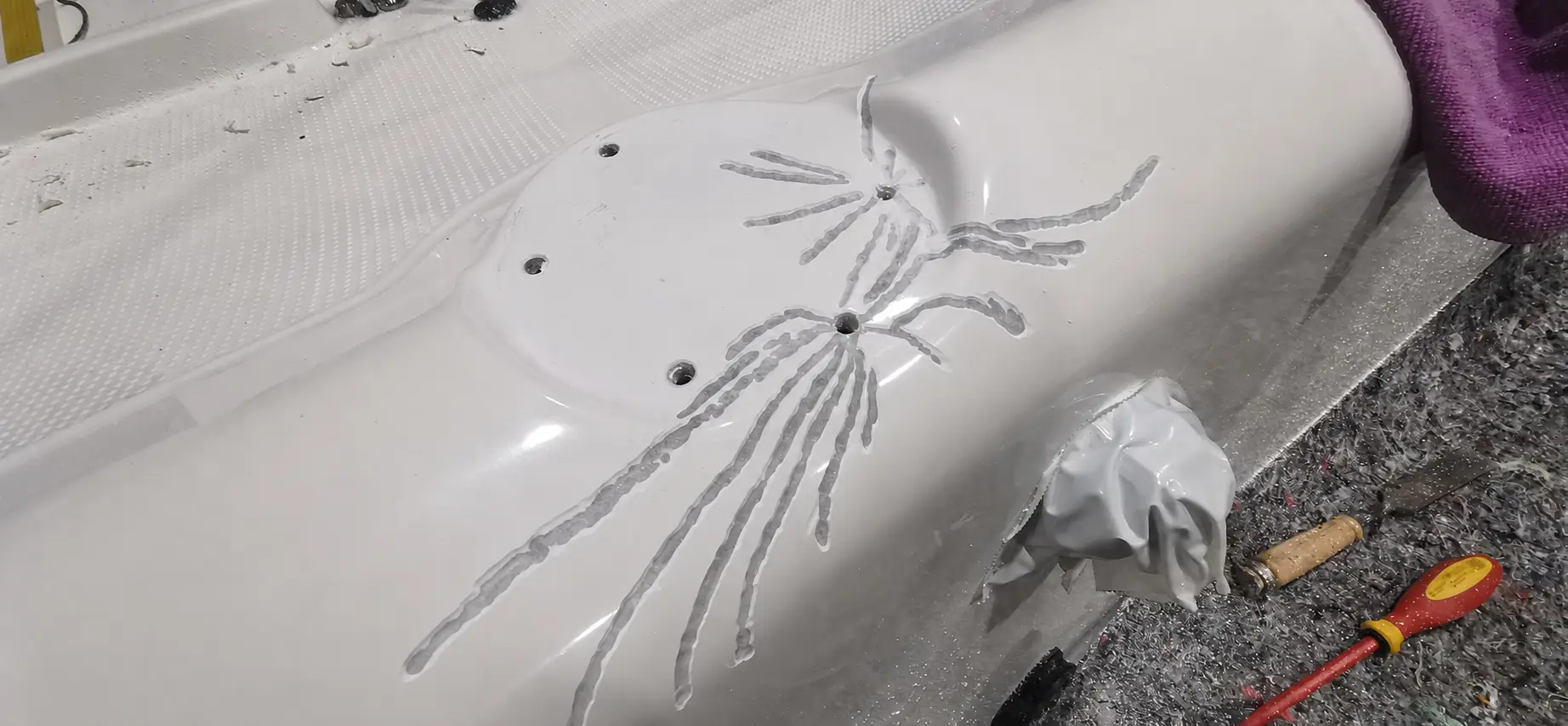 Close view of gelcoat and hull surface inspection
